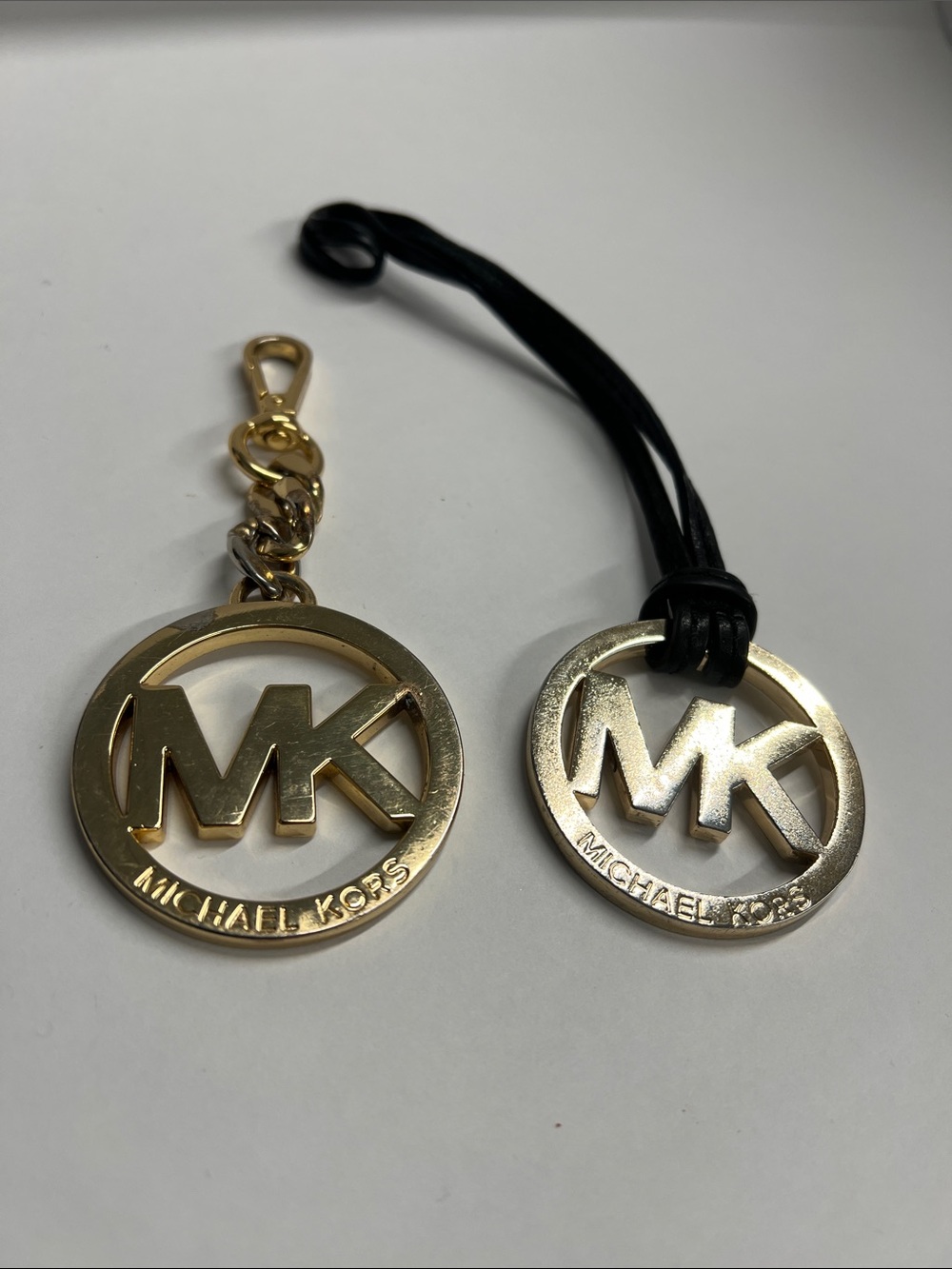 Set of 2 MK Michael Kors Goldtone Purse Fobs